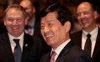 Mr. Nam, president and CEO of DSME, cracks a joke as Premier Darrell Dexter (left) and Rob Bennett, president and CEO of Nova Scotia Power chuckle in the background.